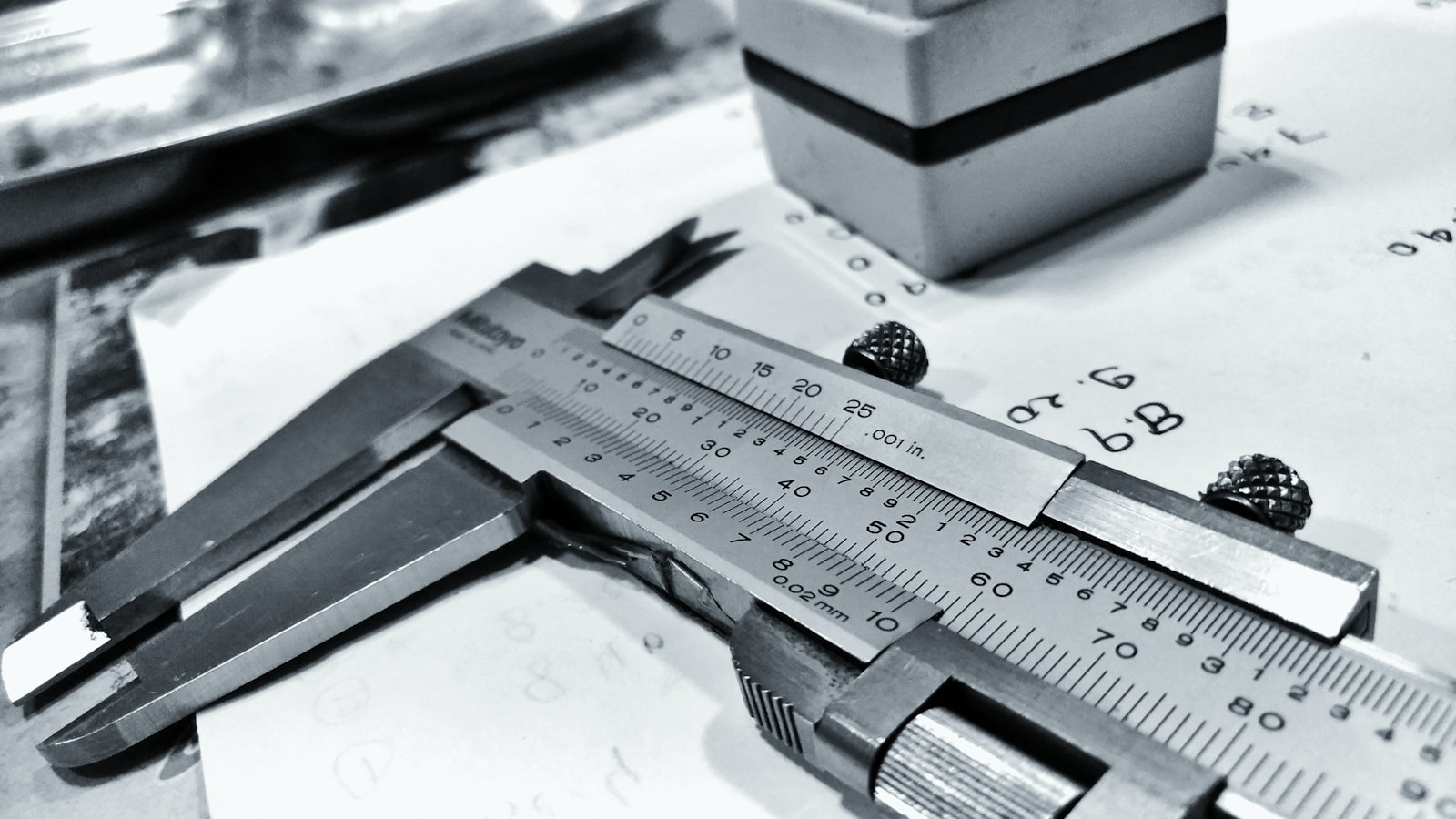 Precision vernier caliper on inspection bench