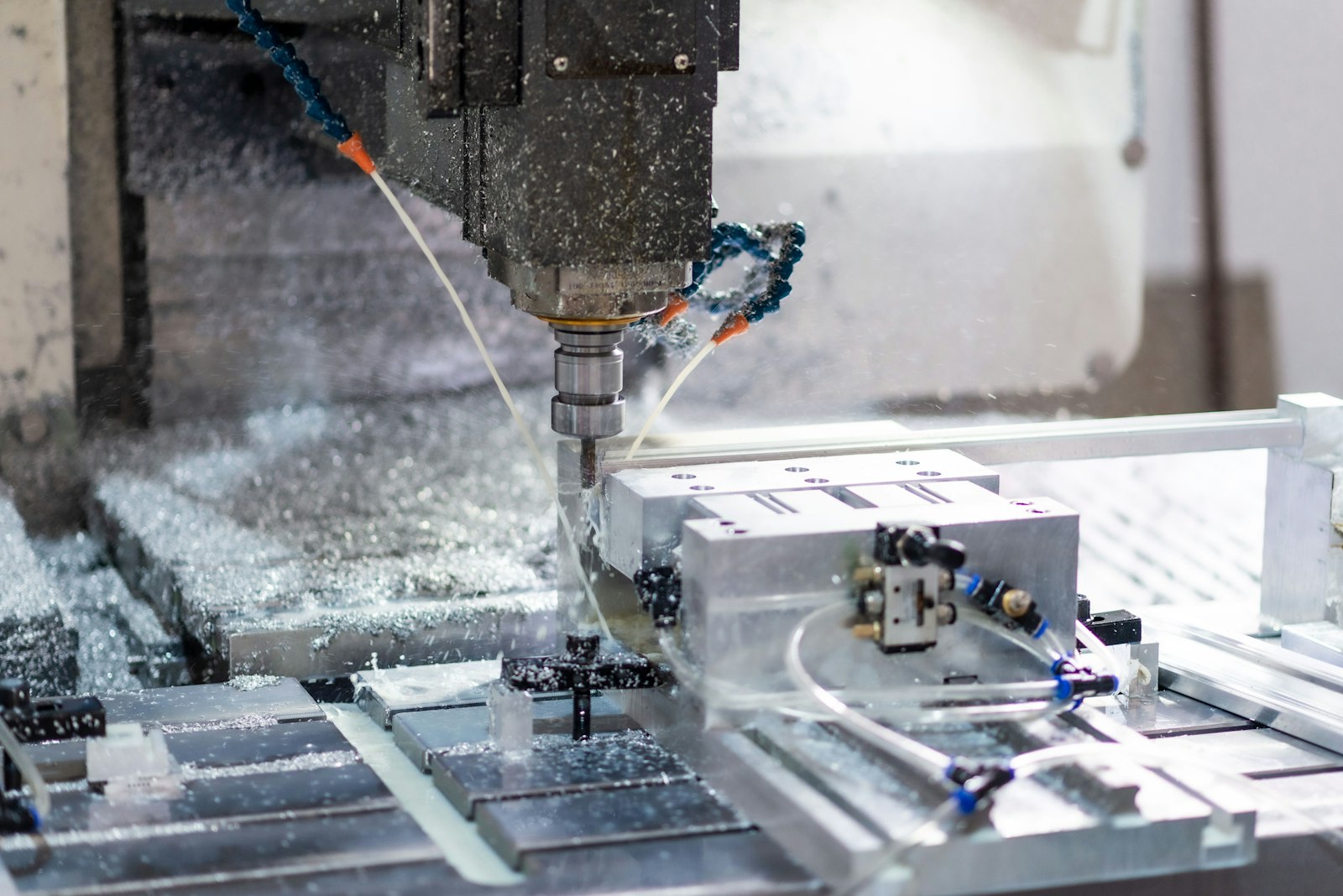 High-speed CNC vertical machining center cutting mold steel with coolant